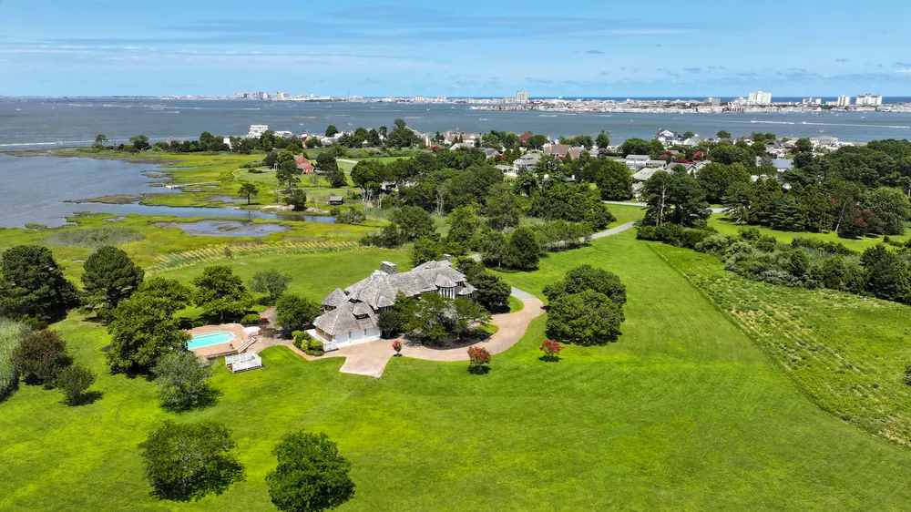 Aerial view of the estate and its lawns, with the marsh, Isle of Wight Bay and the Ocean City skyline in the distance