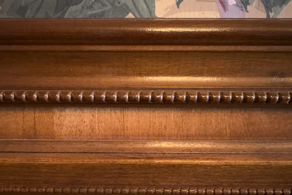 Close view of carved wood molding